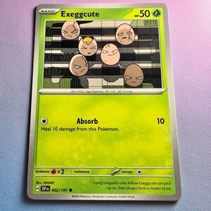 exeggcute - 002/191 (common) — pokemon: surging sparks